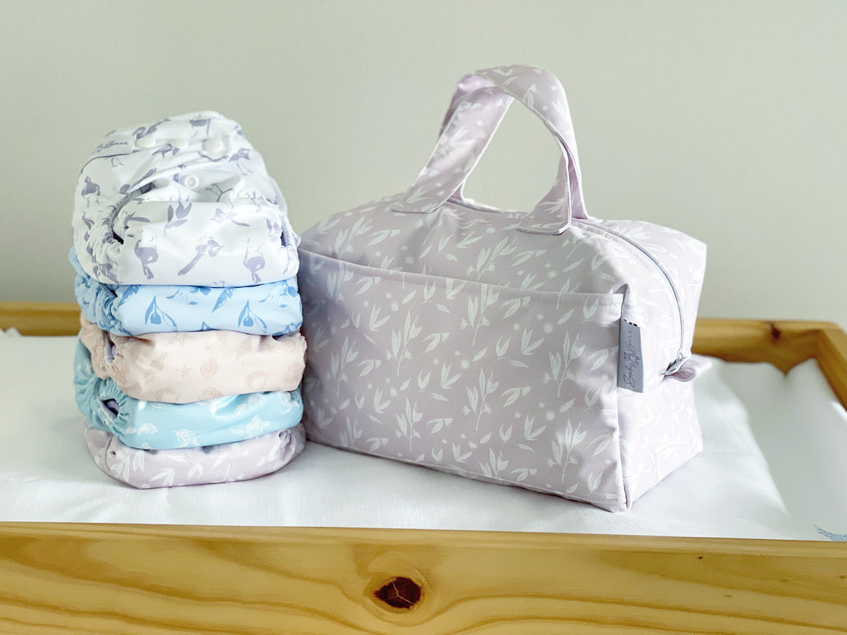 Wet bag with nappies on a baby change table