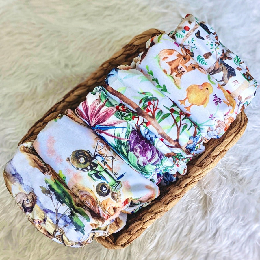Pile of cloth nappies in basket