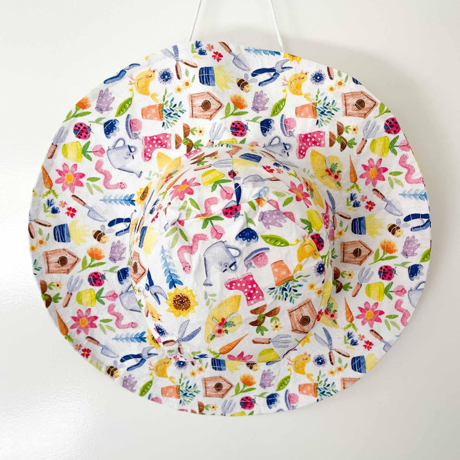 
                  
                    Hat with garden print 
                  
                