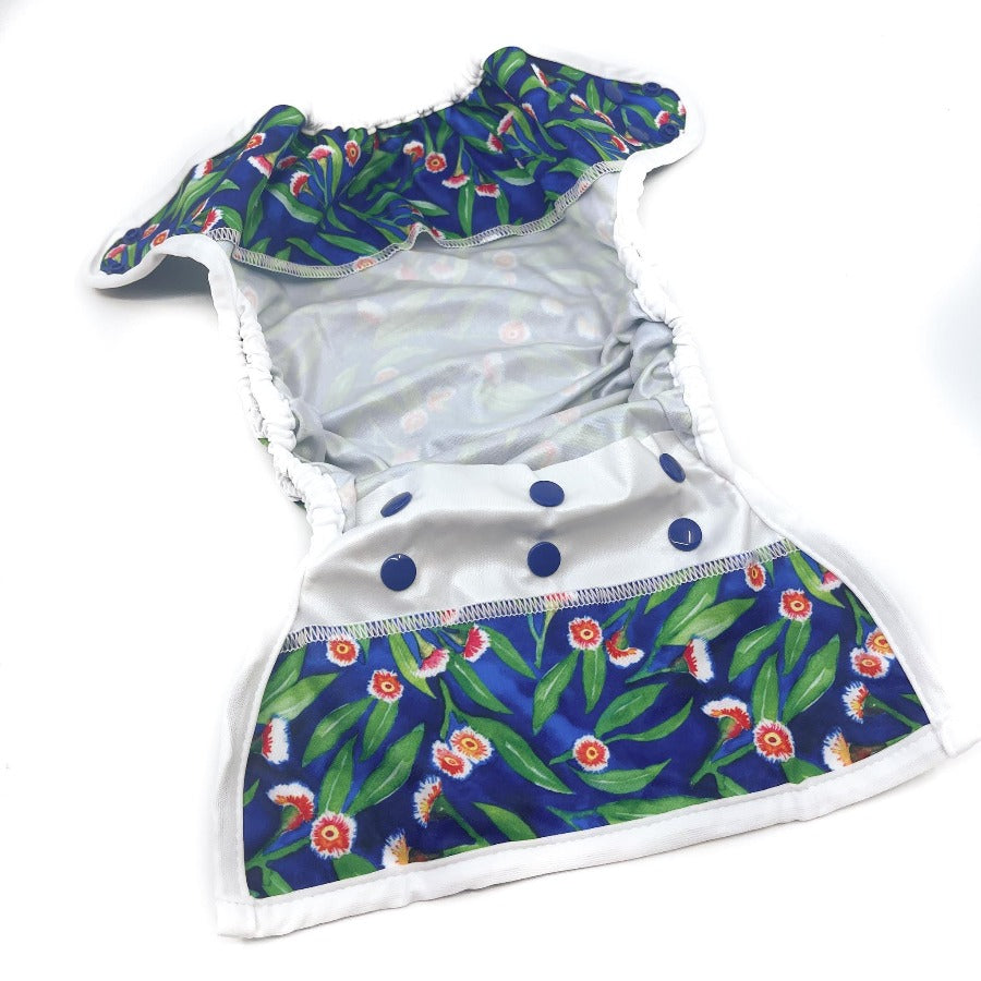 
                  
                    Cloth nappy cover open to show the inner lining
                  
                