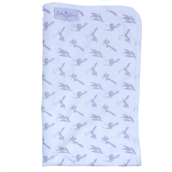 Change mat with purple bird fabric