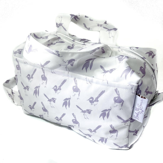 Pod wet bag with purple bird fabric