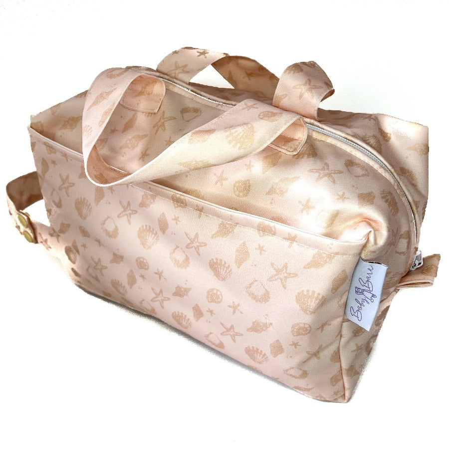 Pod bag with seashell fabric. 