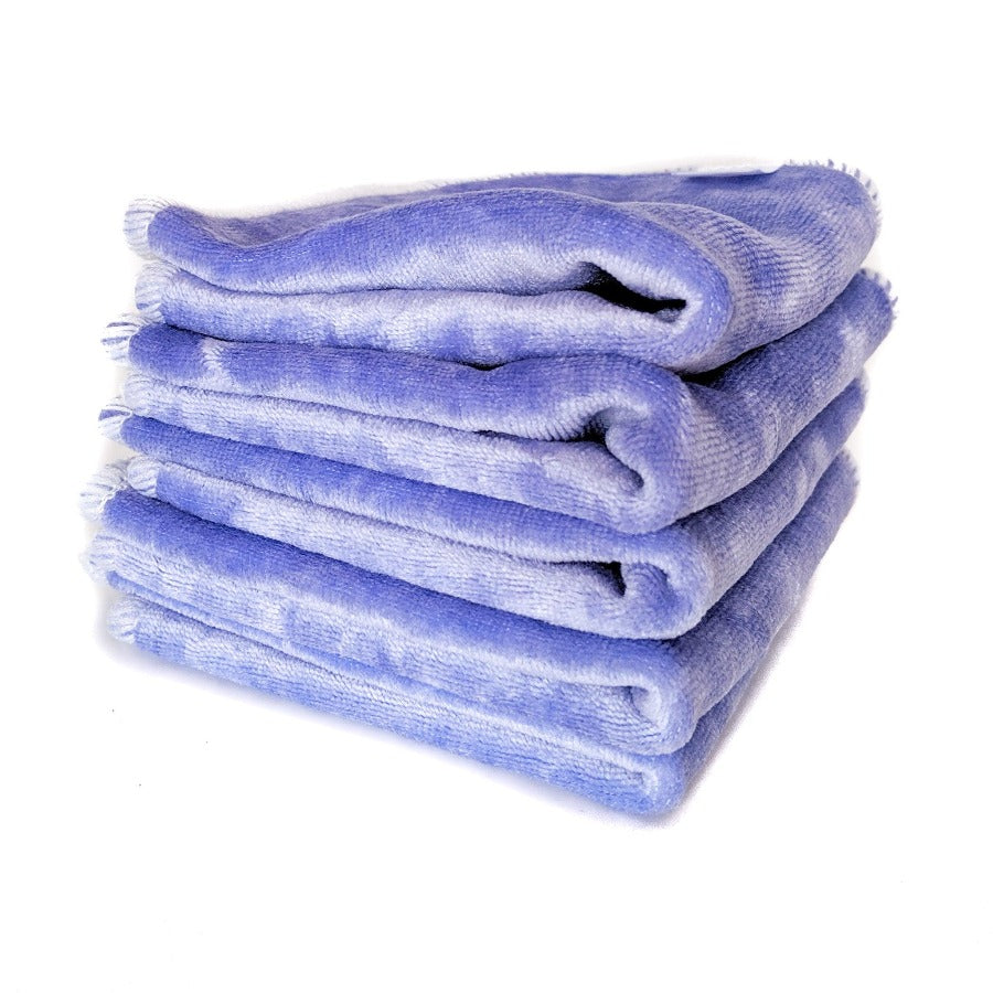 
                  
                    Pile of purple velour cloth wipes.
                  
                