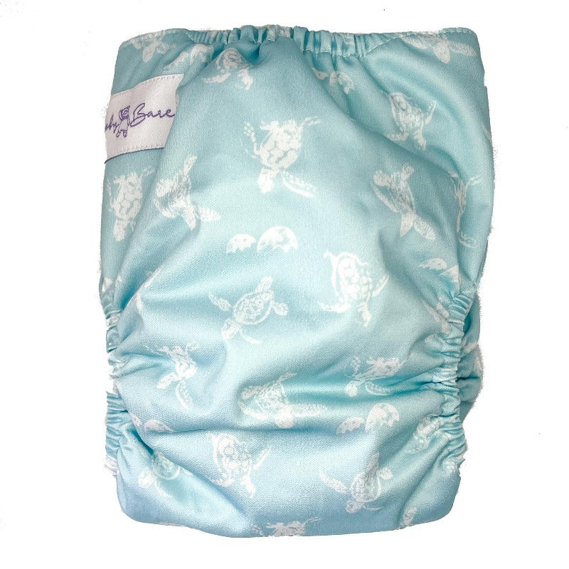 Cloth nappy with turtle print. 