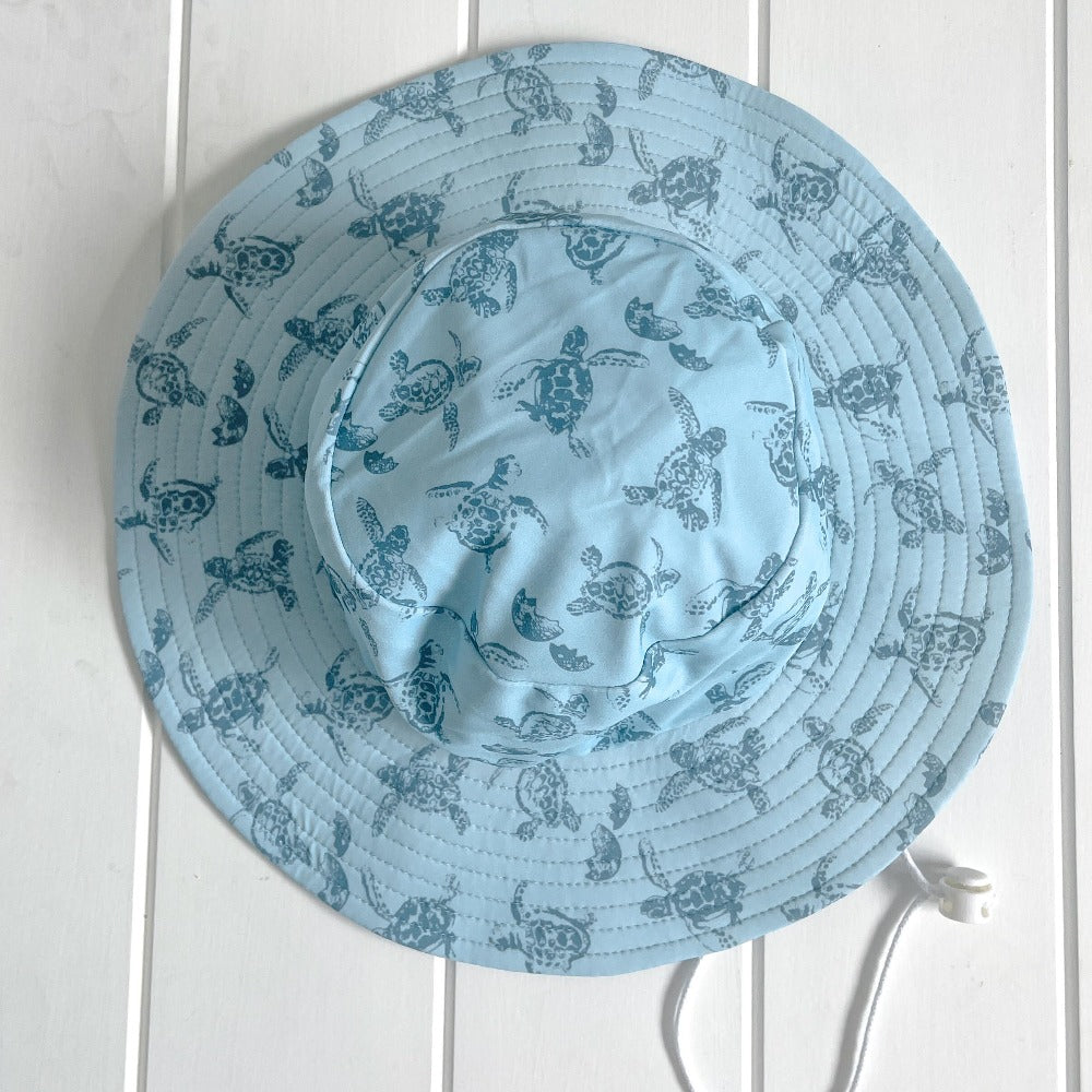
                  
                    Hate with turtle print
                  
                